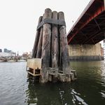 Just west of the Pulaski Bridge near the mouth of the East River. </br>